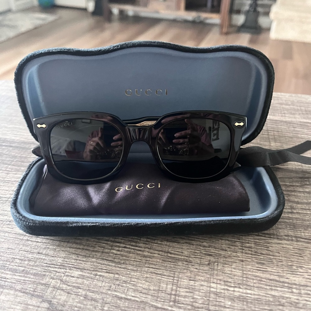 Gucci Dark Sunglasses with Gold Accents